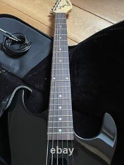 Encore black electric guitar