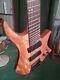 Musoo brand finished 8 strings fanned fret headless electric guitar